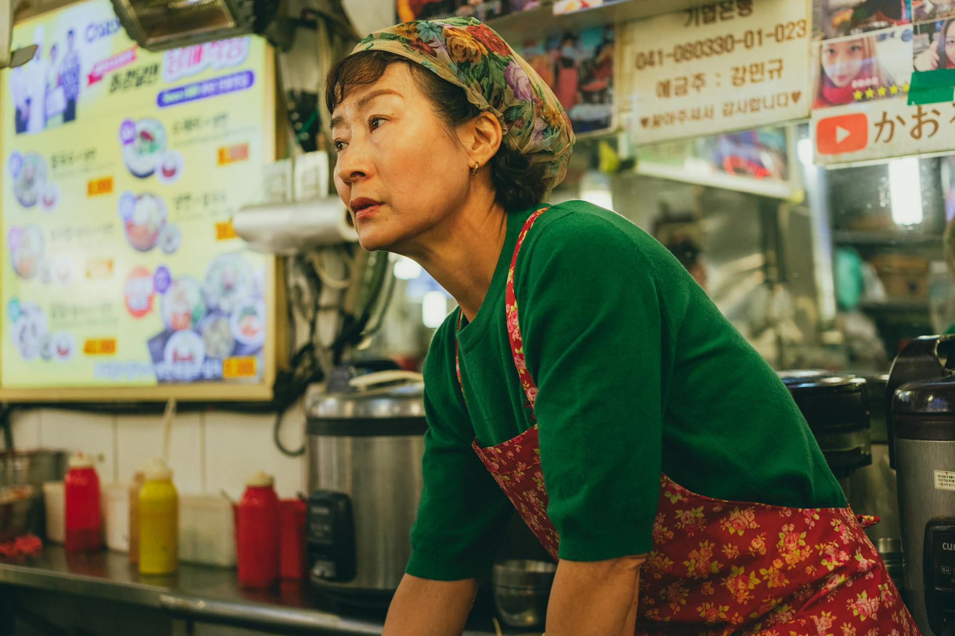 A Korean street food vendor in Seoul market, offering an authentic culinary experience.